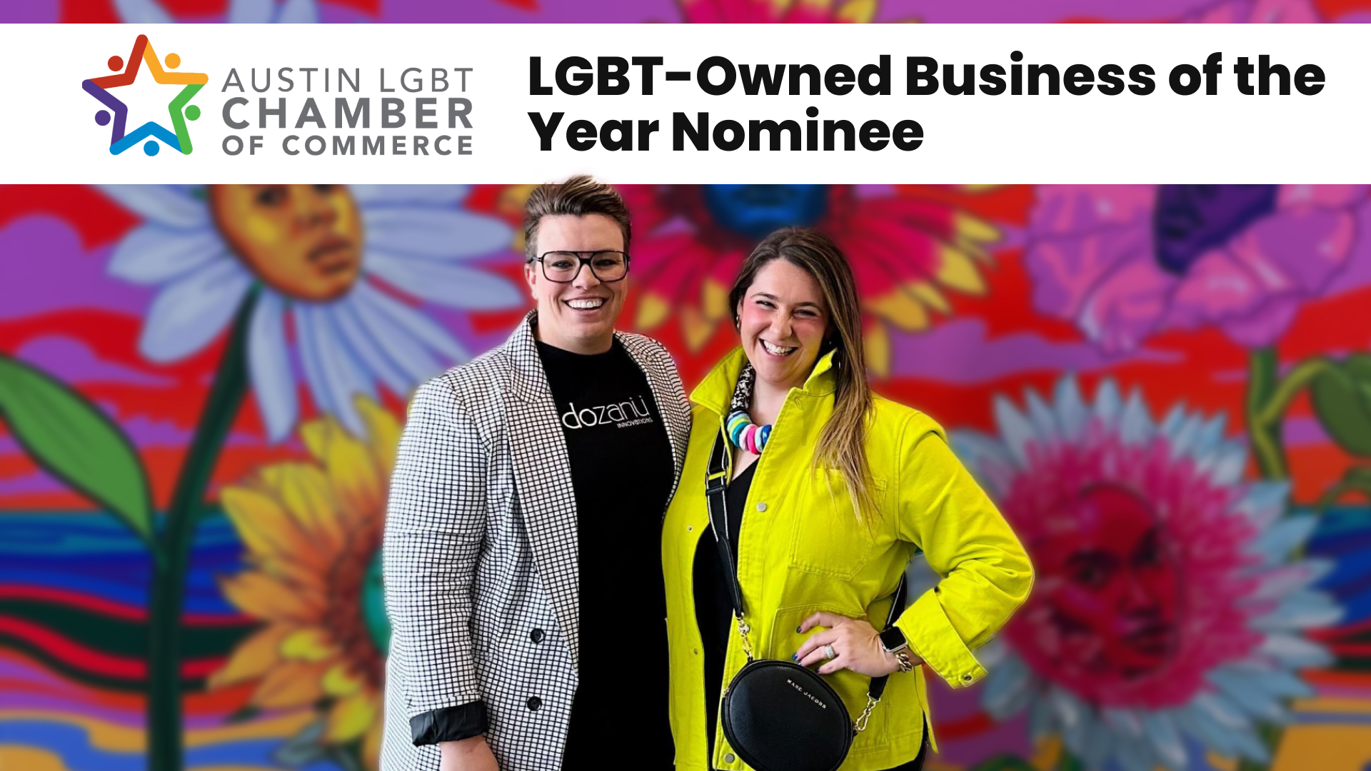 Katherine and Michelle standing together smiling in front of a colorful tie-dye background. The header next to the Austin LGBT chamber of Commerce logo says LGBT-Owned Business of the Year Nominee.